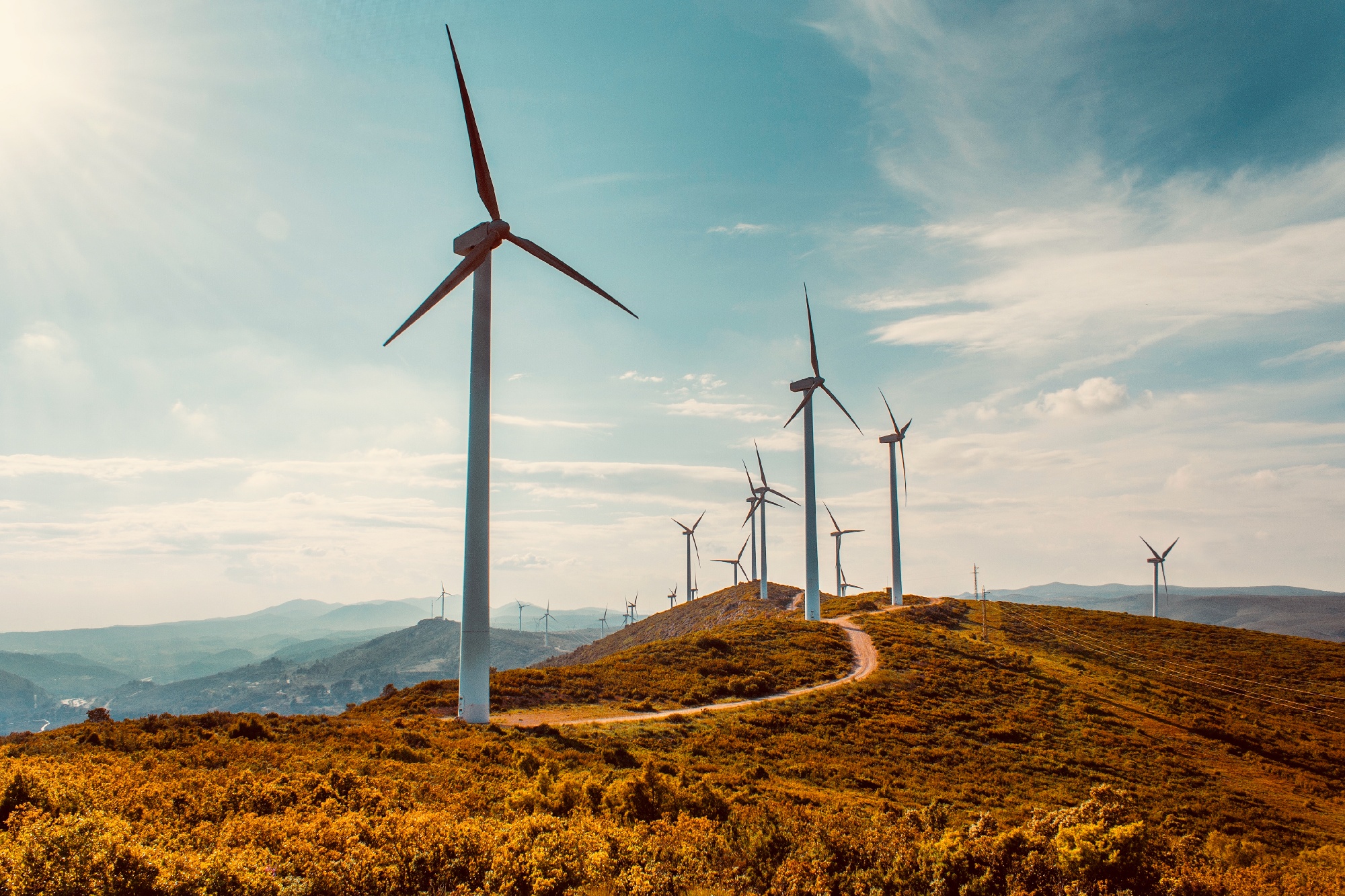 Windmills generating electricity to demonstrate sustainable energy