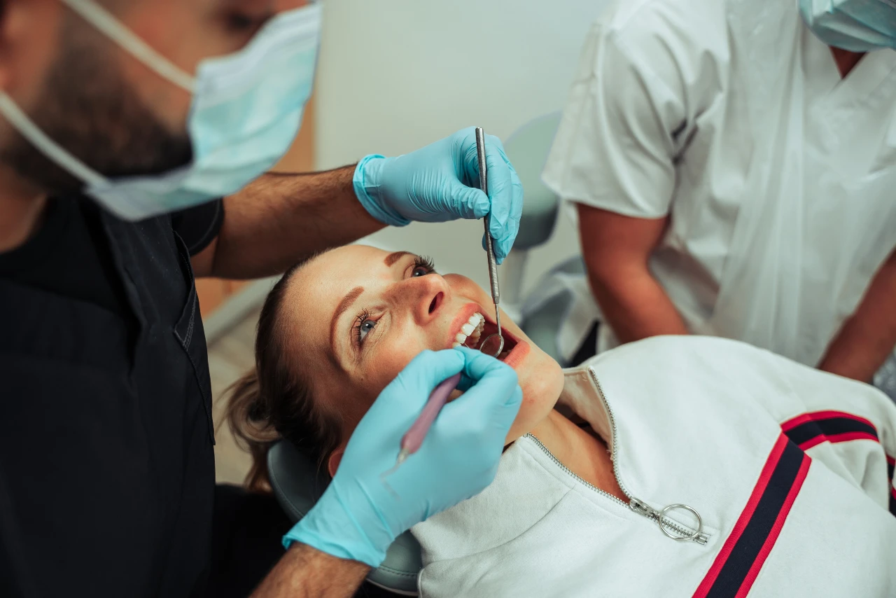 Dentist with patient